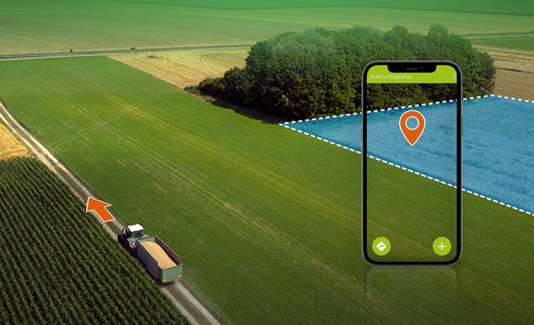 Traktor mit Navigationspfeil und Smartphone mit Navigationspunkt am Feld